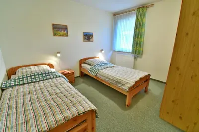 Ein Bett oder Betten in einem Zimmer der Unterkunft ALTES WASSERWERK Whg. AW-07