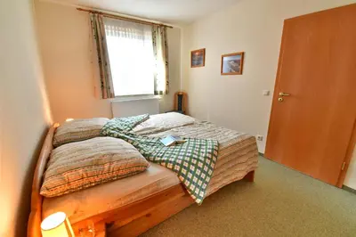 Ein Bett oder Betten in einem Zimmer der Unterkunft ALTES WASSERWERK Whg. AW-07