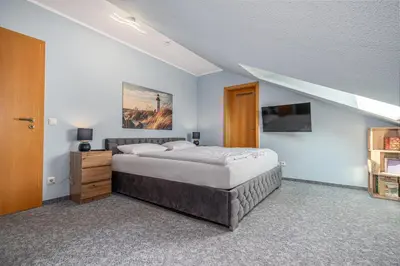 Ein Bett oder Betten in einem Zimmer der Unterkunft ALTES WASSERWERK Whg. AW-24