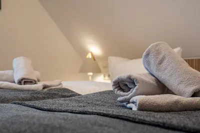 Ein Bett oder Betten in einem Zimmer der Unterkunft OEWERN DIEK Whg. OD-07