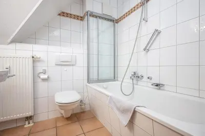 Ein Badezimmer in der Unterkunft OEWERN DIEK Whg. OD-07