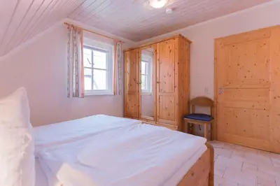 Ein Bett oder Betten in einem Zimmer der Unterkunft Haus WINDFLÜCHTER Whg. LF 6.2