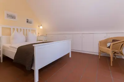 Ein Bett oder Betten in einem Zimmer der Unterkunft Haus LONGARD