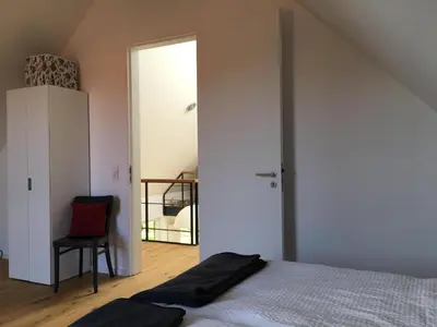 Ein Bett oder Betten in einem Zimmer der Unterkunft Haus LICHT AND MOOR