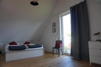 Ein Bett oder Betten in einem Zimmer der Unterkunft Haus LICHT AND MOOR