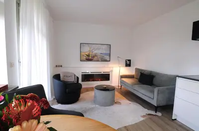 Ein Sitzbereich in der Unterkunft Ferienhaussiedlung Strandperlen Sanddornhof 7d (Typ I)