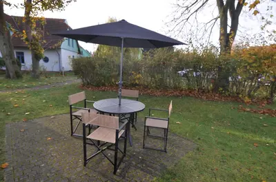 Ein Garten an der Unterkunft Ferienhaussiedlung Strandperlen Sanddornhof 7d (Typ I)