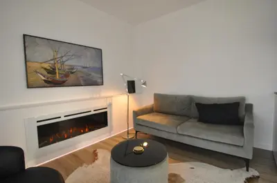 Ein Sitzbereich in der Unterkunft Ferienhaussiedlung Strandperlen Sanddornhof 7d (Typ I)