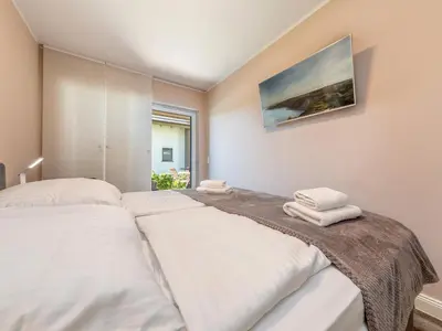 Ein Bett oder Betten in einem Zimmer der Unterkunft Suite Windböe