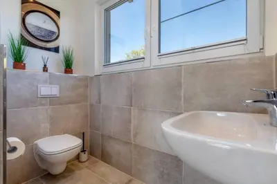 Ein Badezimmer in der Unterkunft Suite Windrose