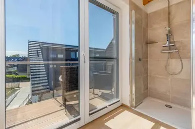 Ein Badezimmer in der Unterkunft Suite Windrose
