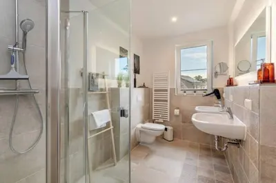 Ein Badezimmer in der Unterkunft Suite Windrose