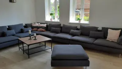 Ein Sitzbereich in der Unterkunft FH Magnolia fuer 12 Pers. mit Terrasse + Dachterasse