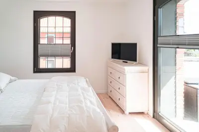 Ein Bett oder Betten in einem Zimmer der Unterkunft Hafenanker