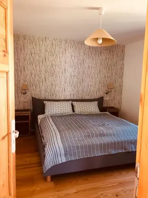 Ein Bett oder Betten in einem Zimmer der Unterkunft Katjas Kate Gartenwohnung