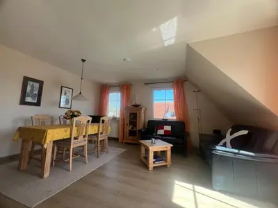 Ein Sitzbereich in der Unterkunft to Hus