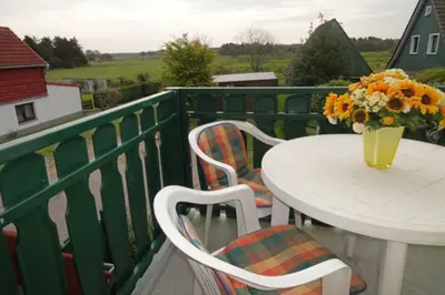 Ein Balkon oder eine Terrasse in der Unterkunft to Hus