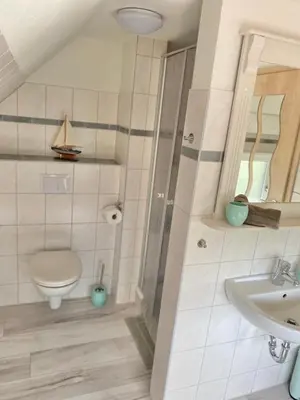 Ein Badezimmer in der Unterkunft ''Zur alten Boddenfischerei'' Ferienwohnung Weitblick