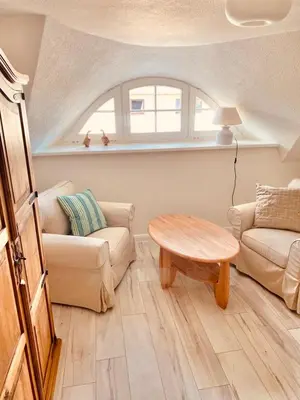 Ein Sitzbereich in der Unterkunft ''Zur alten Boddenfischerei'' Ferienwohnung Weitblick
