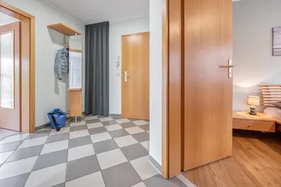 Ein Bett oder Betten in einem Zimmer der Unterkunft Friedenstraße 17 Whg 3