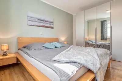 Ein Bett oder Betten in einem Zimmer der Unterkunft Friedenstraße 17 Whg 3