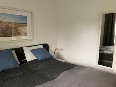 Ein Bett oder Betten in einem Zimmer der Unterkunft Die kleine Acht - direkt am Strand