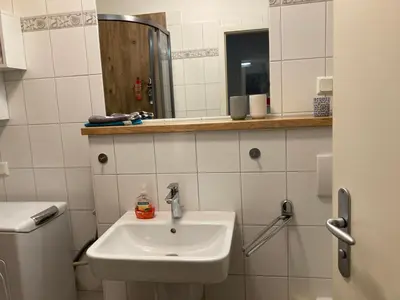 Ein Badezimmer in der Unterkunft Die kleine Acht - direkt am Strand