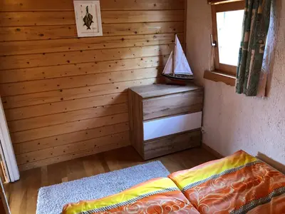 Ein Bett oder Betten in einem Zimmer der Unterkunft Ferienhaus Möwenherz
