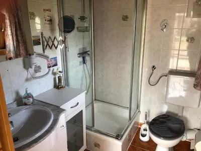 Ein Badezimmer in der Unterkunft Ferienhaus Möwenherz