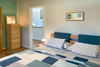 Ein Bett oder Betten in einem Zimmer der Unterkunft Sterntaucher 06