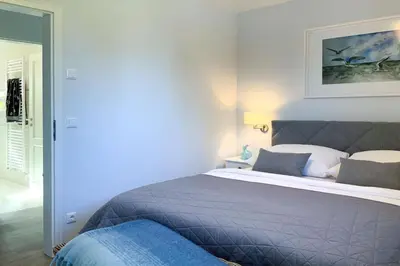 Ein Bett oder Betten in einem Zimmer der Unterkunft Sterntaucher 05
