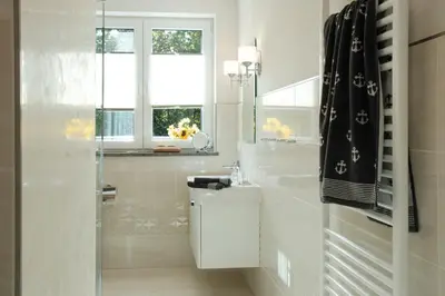 Ein Badezimmer in der Unterkunft Sterntaucher 05