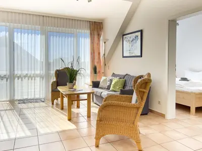 Ein Sitzbereich in der Unterkunft Residenz am Strand, Whg 242