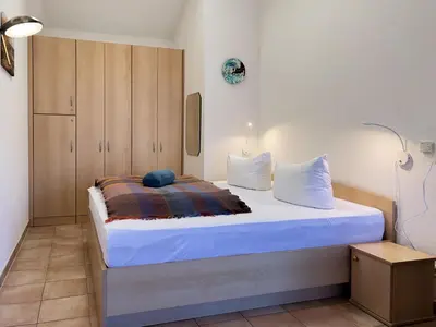 Ein Bett oder Betten in einem Zimmer der Unterkunft Residenz am Strand, Whg 123