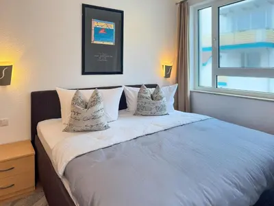 Ein Bett oder Betten in einem Zimmer der Unterkunft Residenz am Strand, Whg 232