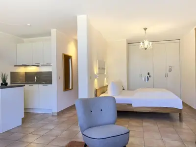Ein Bett oder Betten in einem Zimmer der Unterkunft Residenz am Strand, Whg 238