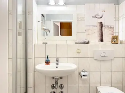 Ein Badezimmer in der Unterkunft Residenz am Strand, Whg 238