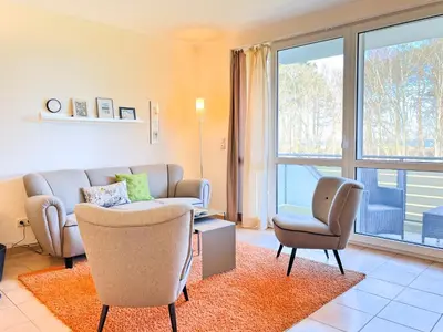 Ein Sitzbereich in der Unterkunft Residenz am Strand, Whg 238