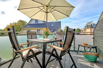 Ein Balkon oder eine Terrasse in der Unterkunft Mondmuschel