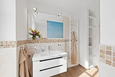 Ein Badezimmer in der Unterkunft Mondmuschel