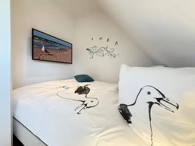 Ein Bett oder Betten in einem Zimmer der Unterkunft Ocean Star