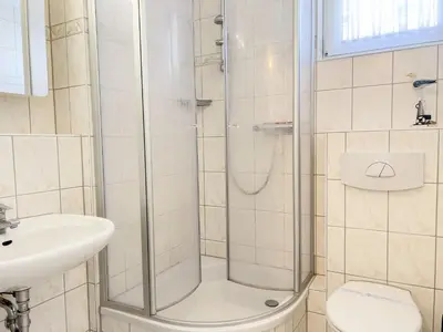 Ein Badezimmer in der Unterkunft Residenz am Strand, Whg 352