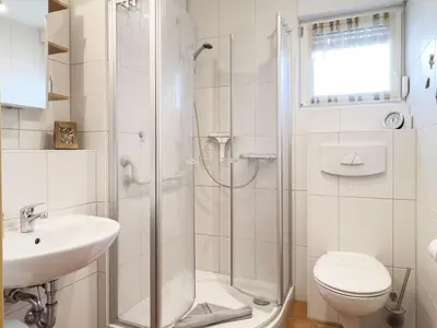 Ein Badezimmer in der Unterkunft Residenz am Strand, Whg 567