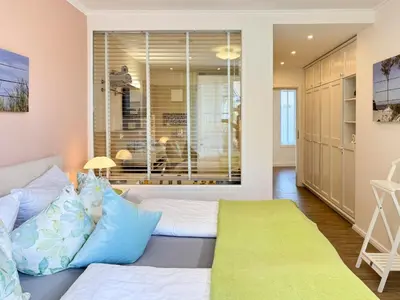 Ein Bett oder Betten in einem Zimmer der Unterkunft Käptn ADI