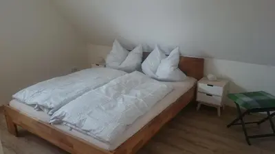 Ein Bett oder Betten in einem Zimmer der Unterkunft Ferienwohnung Sonnenschein