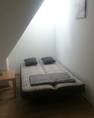 Ein Bett oder Betten in einem Zimmer der Unterkunft Ferienwohnung Sonnenschein