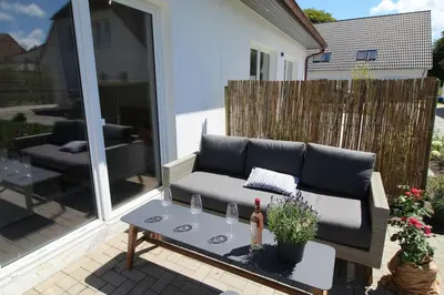 Ein Sitzbereich in der Unterkunft Bodden Perle