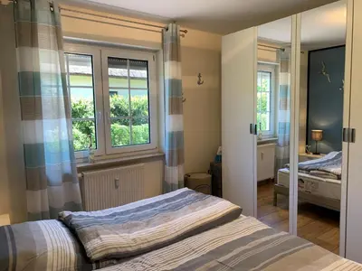Ein Bett oder Betten in einem Zimmer der Unterkunft Friedenstraße 17 Whg 2