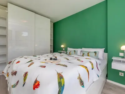 Ein Bett oder Betten in einem Zimmer der Unterkunft Wellengeflüster