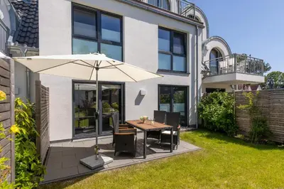Ein Garten an der Unterkunft Wellengeflüster